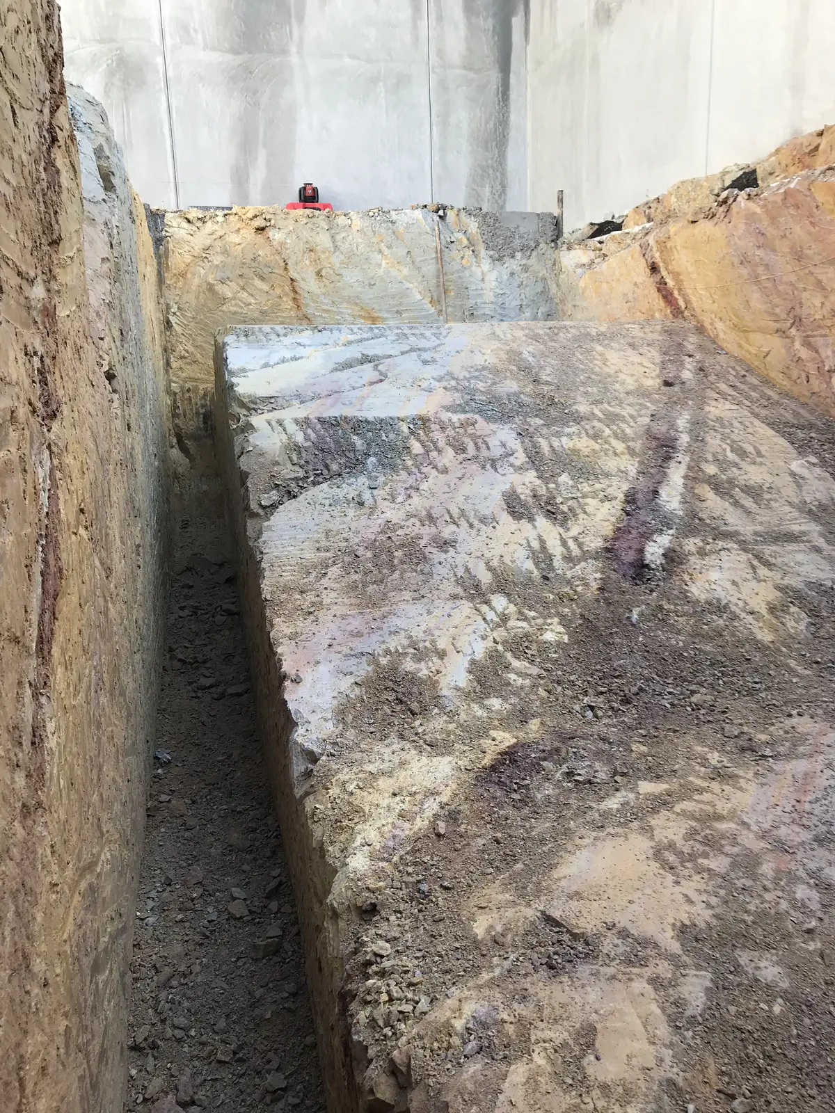 Cut rock face exposed during site excavation