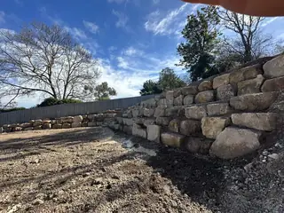 Close-up of natural rockwall retaining construction